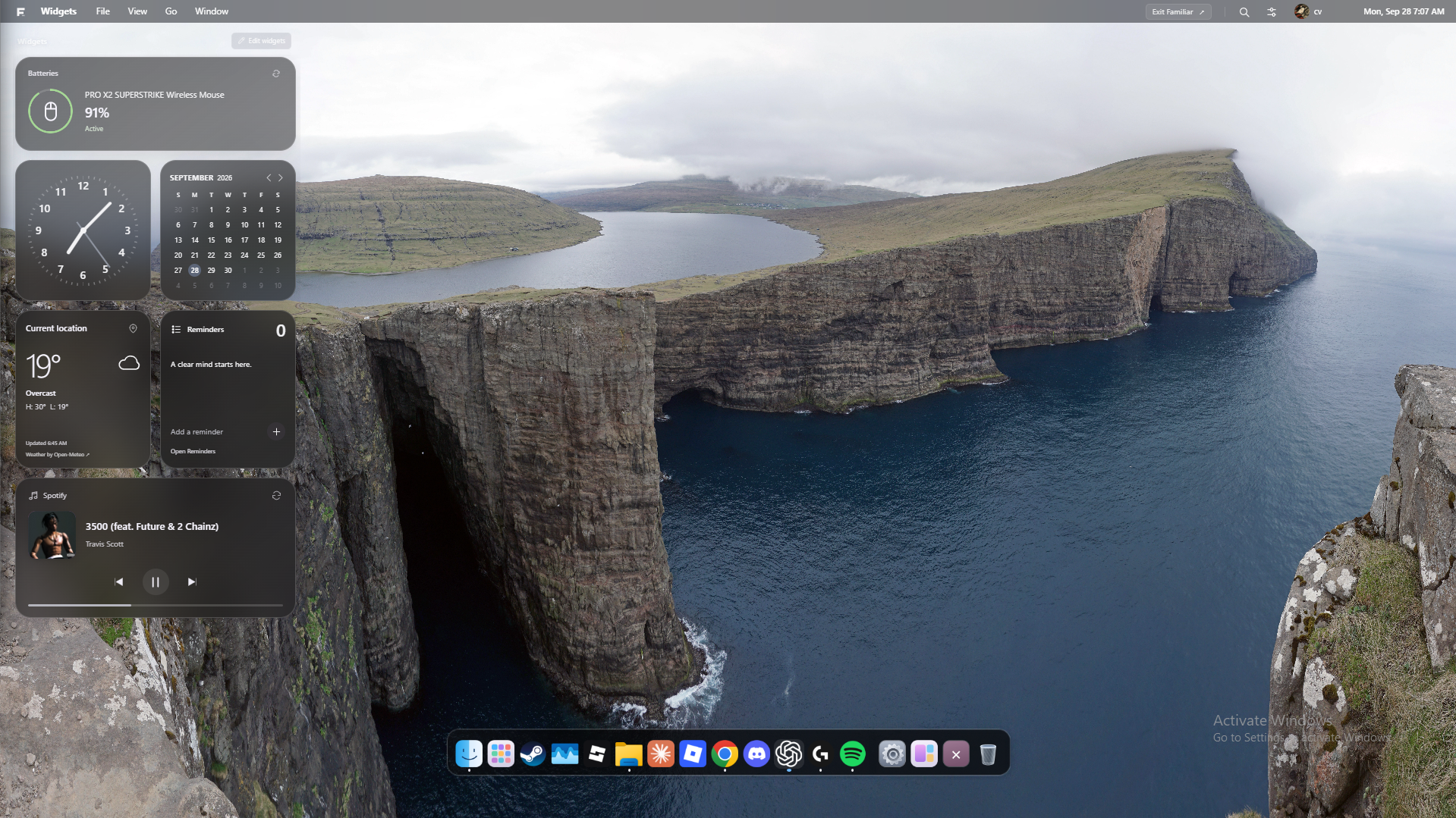 Familiar running on Windows with a Faroe Islands wallpaper, glass widgets and an app dock.
